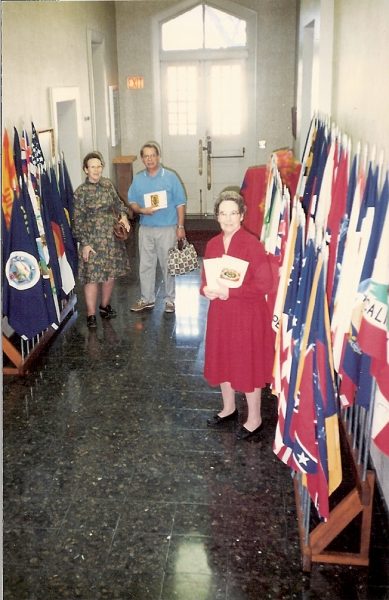 Grandma and her flags! (Dad and Aunt Wanda in the background.