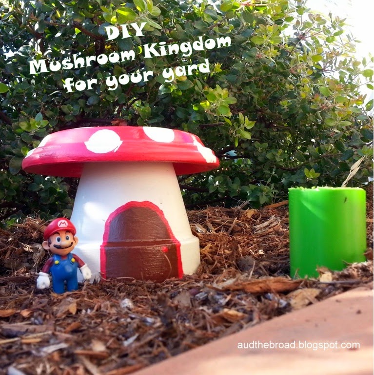 Mario figure standing next to a mushroom house in a garden with text overlay "DIY Mushroom Kingdom for your yard."