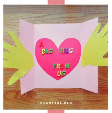card with heart and hand cut outs