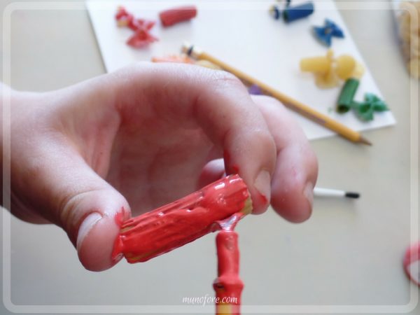 Pasta Angels: christmas ornaments made with uncooked pasta. Use as a tree decoration or on Christmas presents. Kids craft.