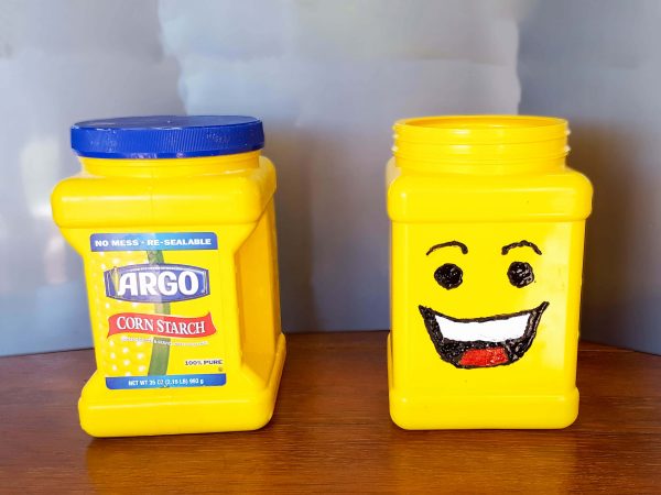 Lego minifig head from cornstarch container