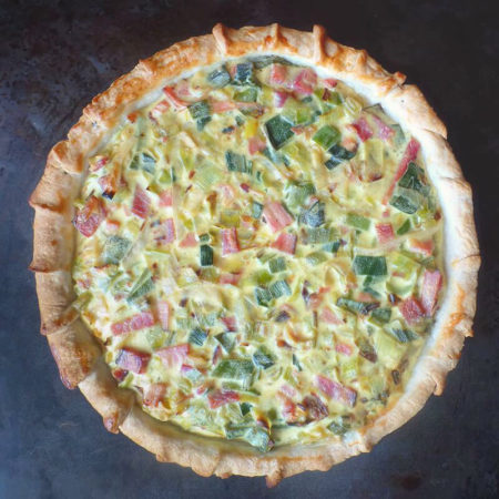 Ham and Leek Pie on a metal baking sheet