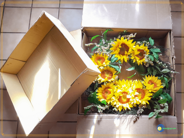 sunflower wreath in packing box