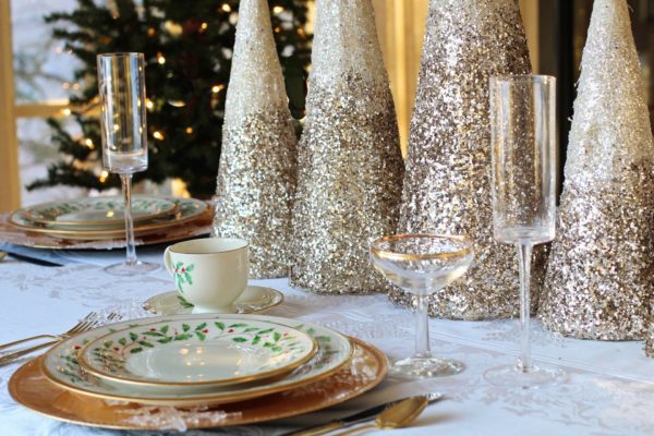 gold glitter trees on Christmas dinner table