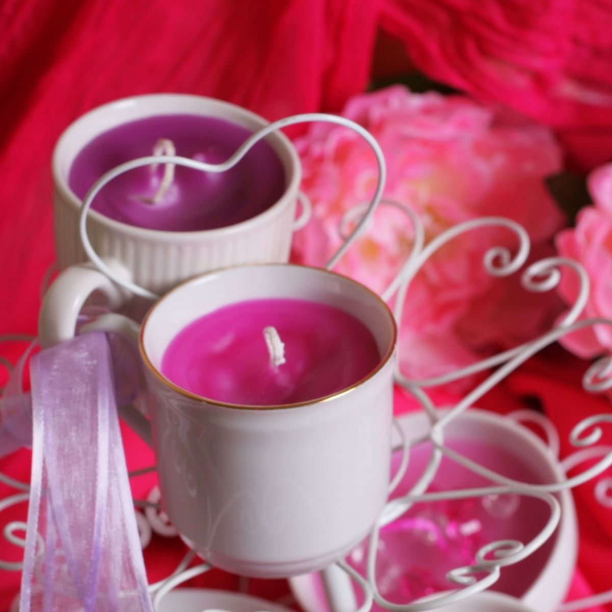 candles in tea cups