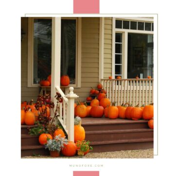 front porch decorated with pumpkins