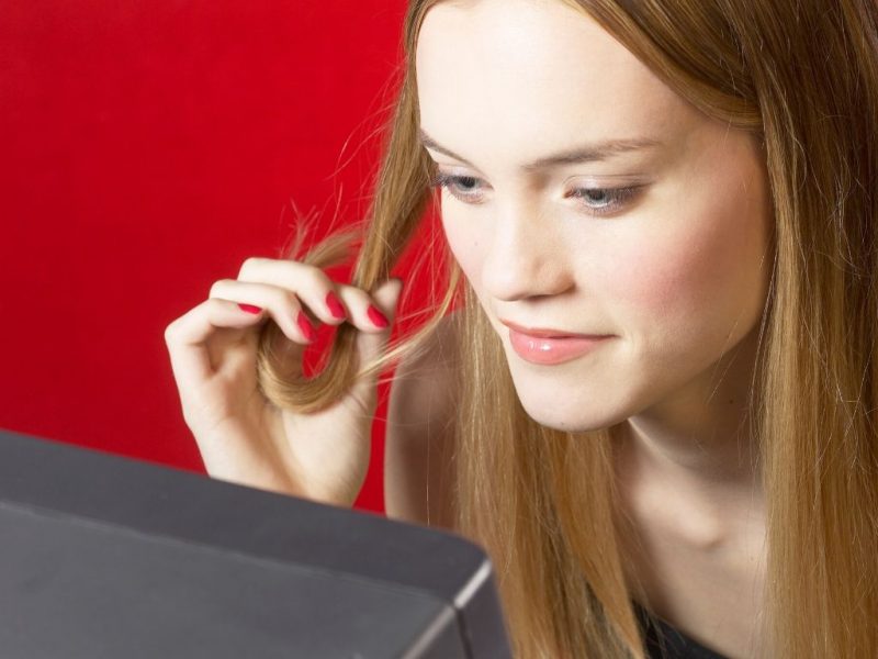 woman twirling her hair