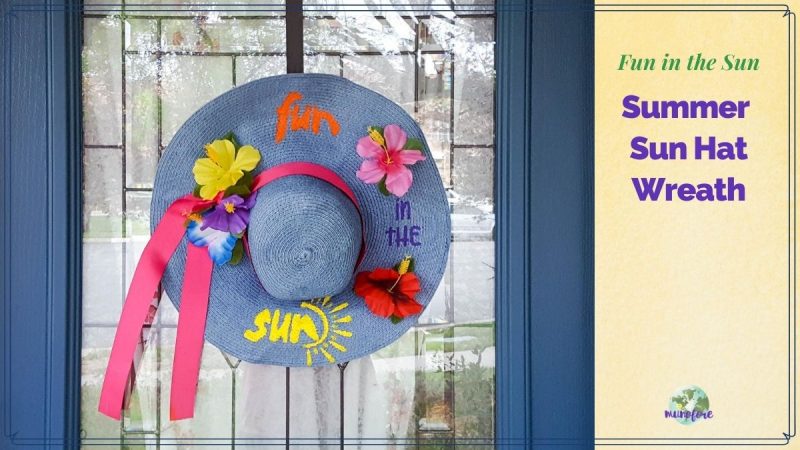 Decorated summer beach hat hung on a door with text overlay "Fun in the Sun Summer Sun Hat Wreath"