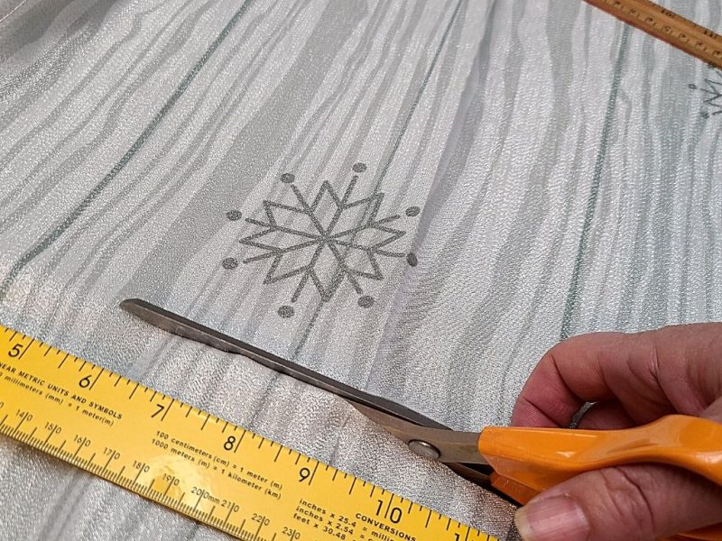 cutting holiday fabric