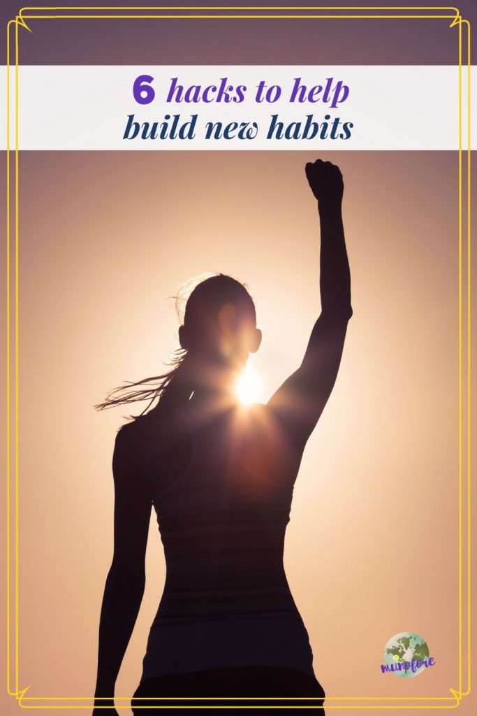 woman raising her arm in the sunlight with text overlay "6 hacks to help you build new habits"