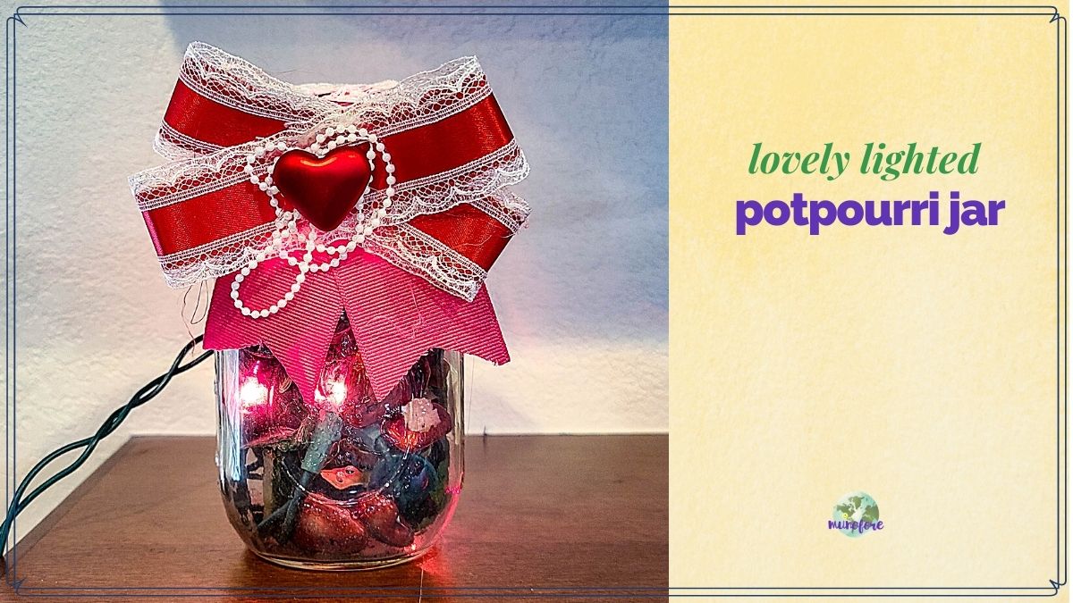 mason jar filled with potpourri and christmas lights with text overlay "lovely lighted potpourri jar"