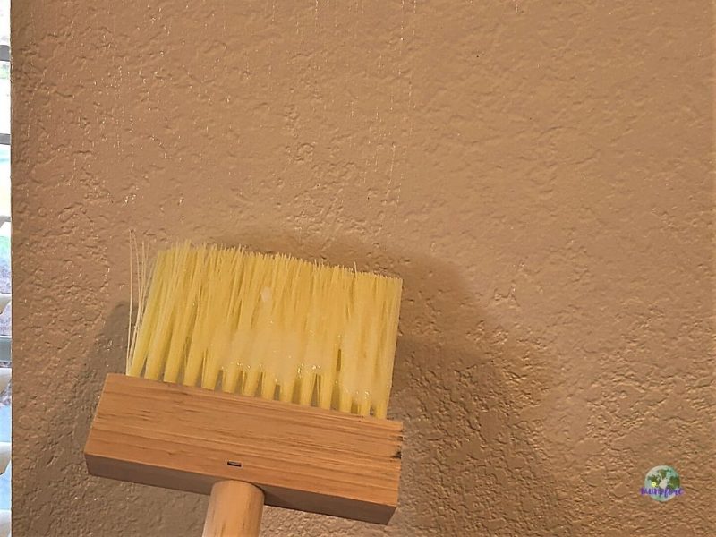 applying wallpaper paste