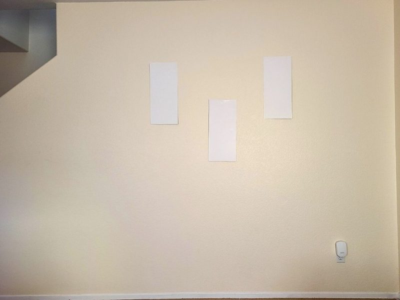 paper hanging on a blank wall
