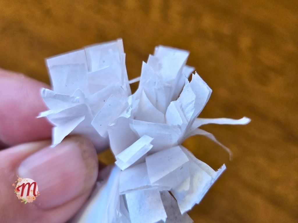 fluffing up crepe paper ruffle